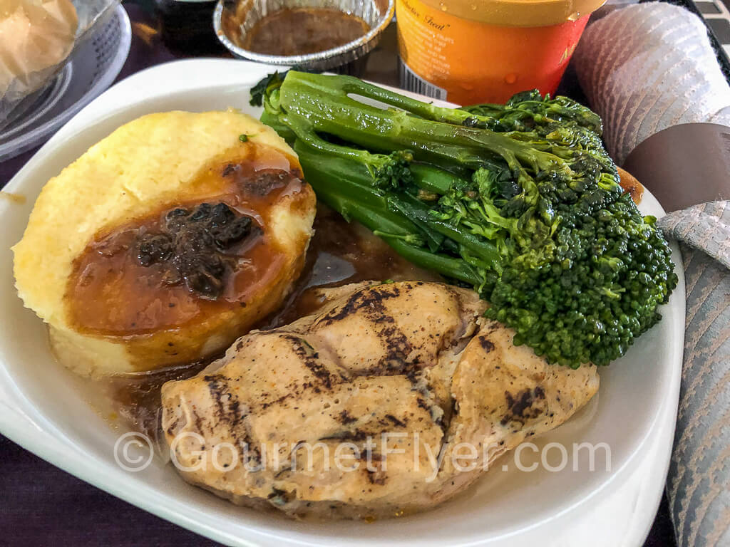United Premium Economy Premium Plus dinner - chicken with mushroom gravy and polenta