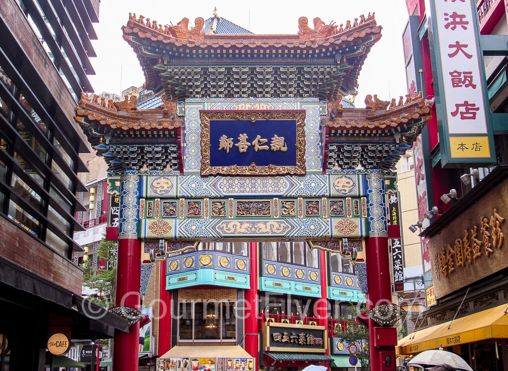 A traditional Chinatown arched gateway called a paifang marks the entrance to Yokohama's Chinatown.