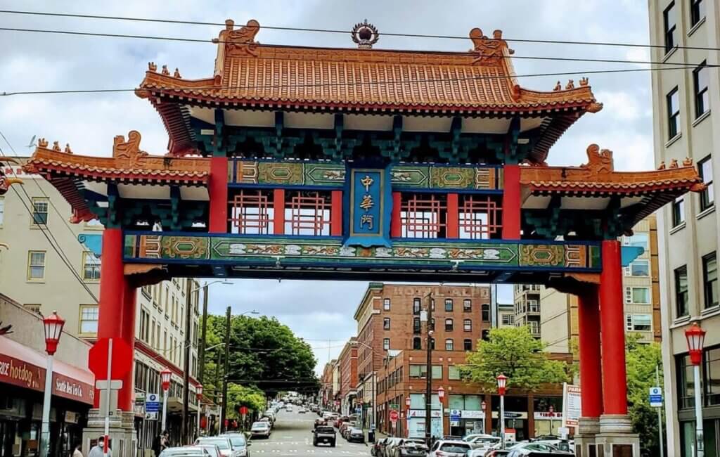 The entrance to Chinatown in Seattle is marked by a majestic red torii gate.