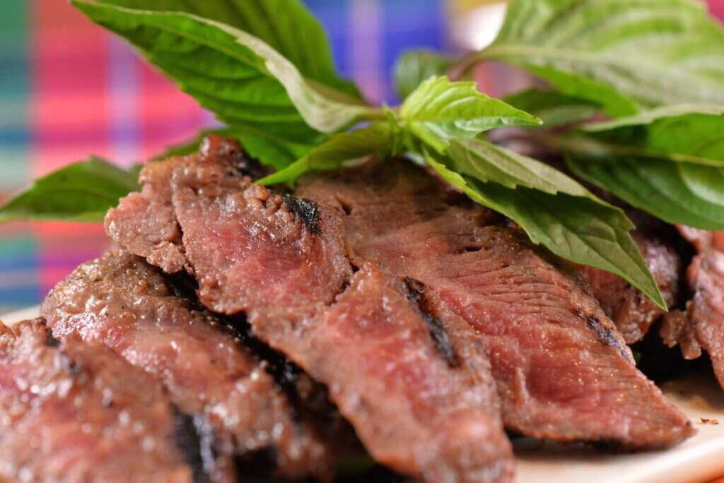 Crying Tiger - sliced flat iron steak grilled to medium rare.