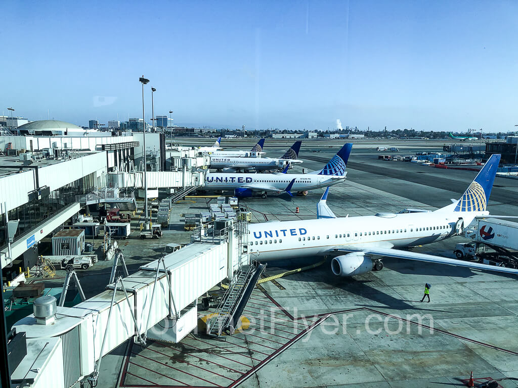 View from the United Club's windows. Several United Airlines' planes are parked at terminal 7.