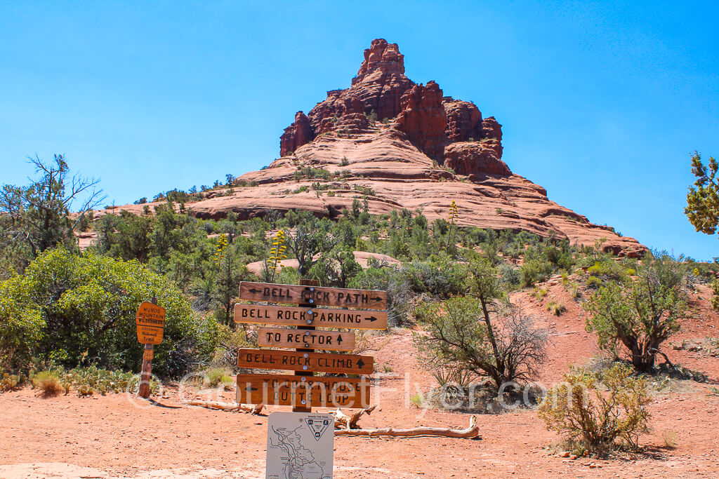 Signs at the intersection of several trails leading to the Bell Rock.