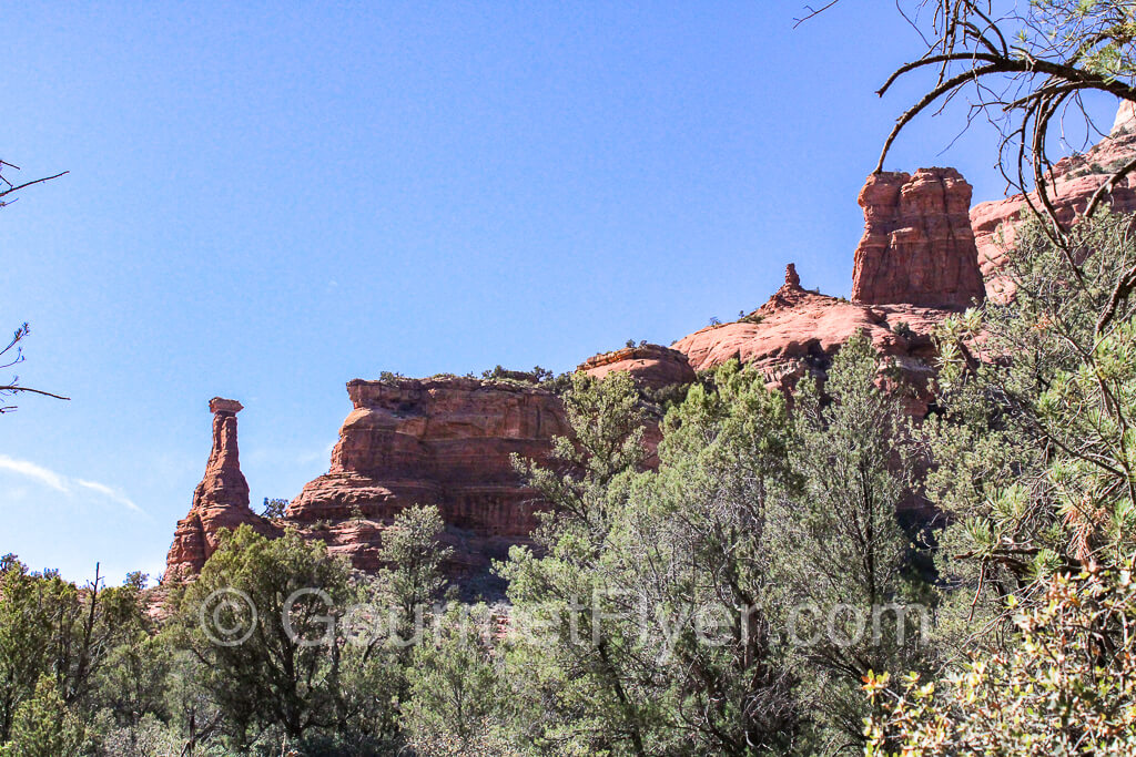 The slender rock formation called the Kachina Woman formation at Boynton Caynon.
