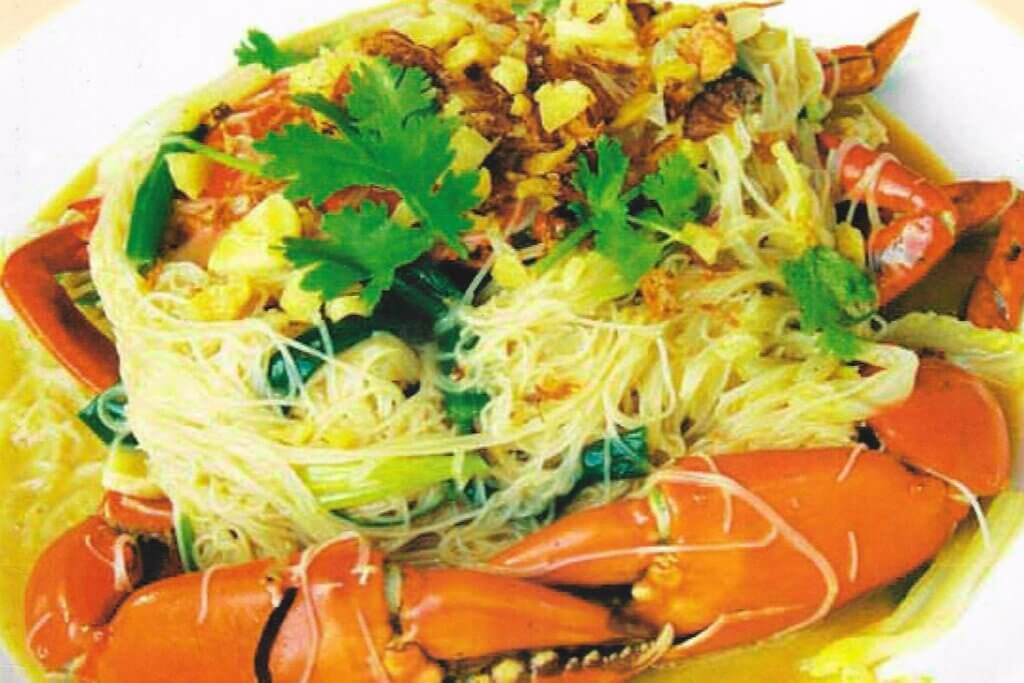 Crab cooked in a rich brown sauce and served over thin rice vermicelli.