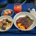Review of United Airlines' Polaris flight. - dinner tray.