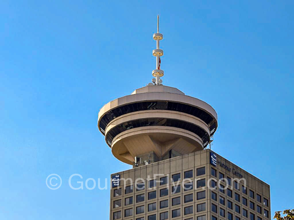 The circular observation deck of the Vancouver Lookout sits atop the Harbor Center Building.