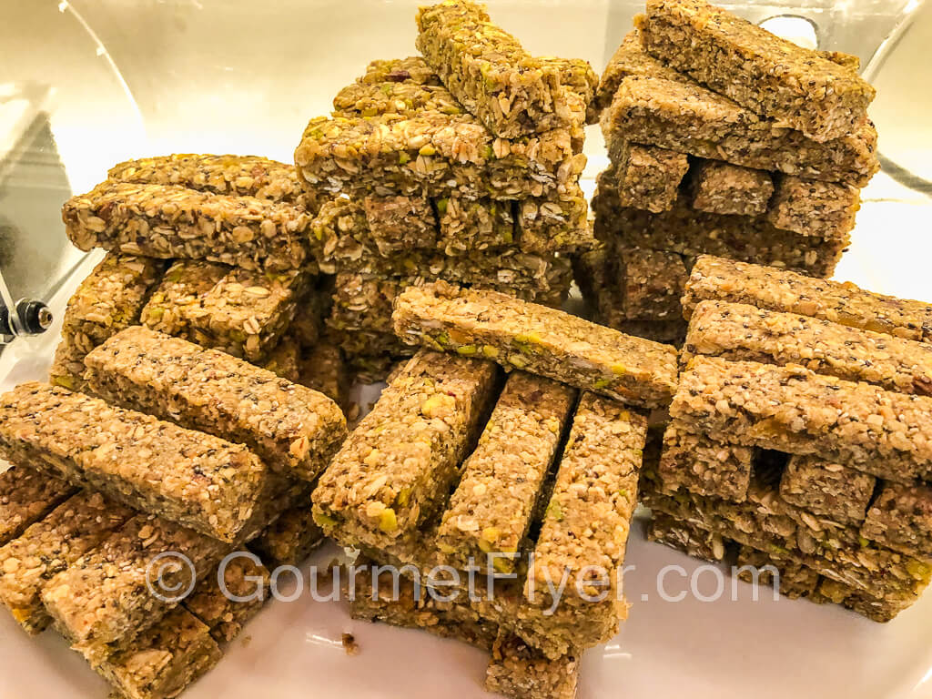 A pile of pasteli stacked like game pieces.