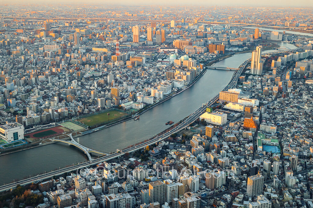 The city of Tokyo and the river and bridges viewed from the Tembo Deck.