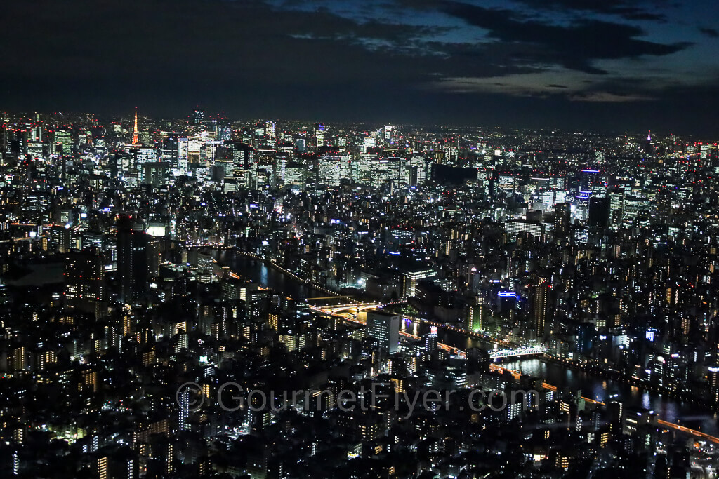Night scene of the city of Tokyo viewed from the top deck of the Skytree.