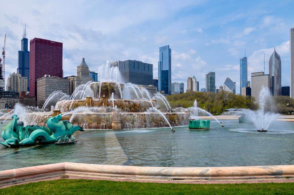 A huge fountain with 3 levels of water jets spraying dozens of streams of water.