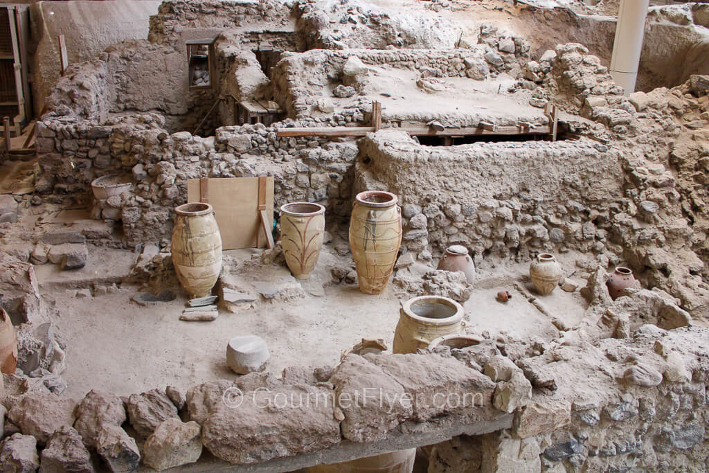 The ruins of a pre-historic structure with potteries and rubbles.