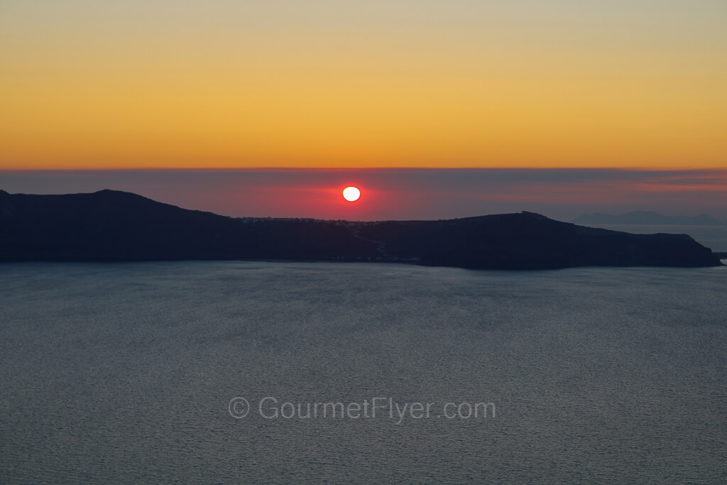 Sunset view of the Caldera at Santorini viewed from the Atlantis Hotel.