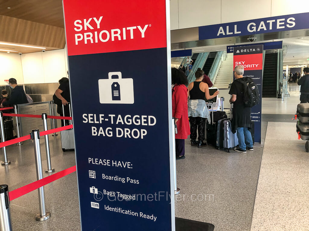An area of Delta Airlines within LAX is designated Sky Priority with a sign.