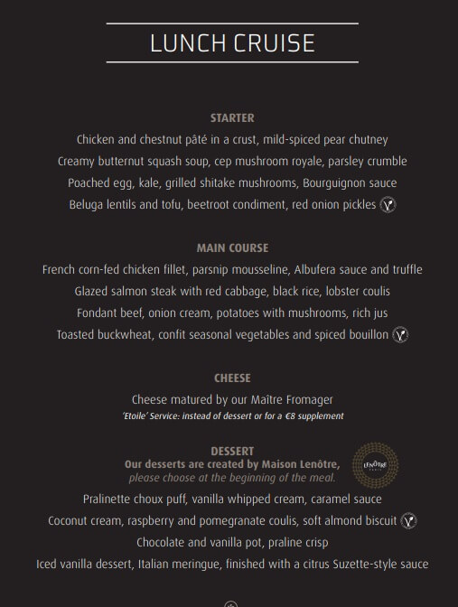 A lunch menu with white printing on black background shows the options for starter, main course, cheeses, and dessert.