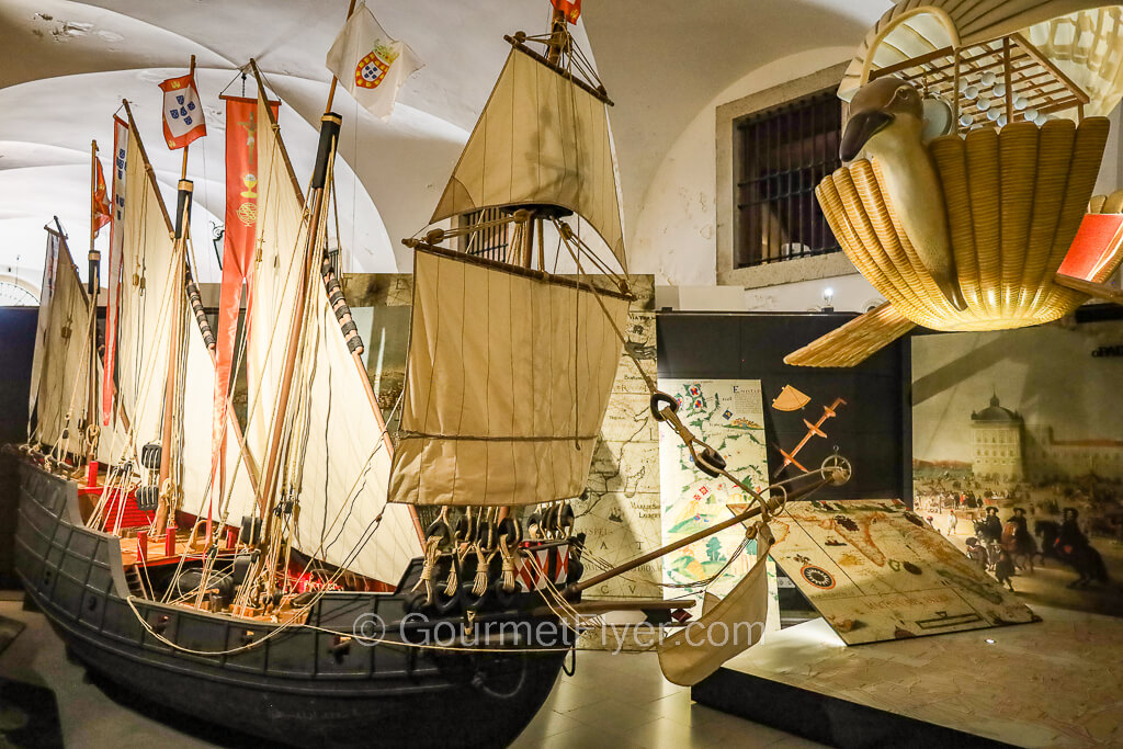 A model of a large 18th century type explorer ship with all its sails hoisted is displayed.