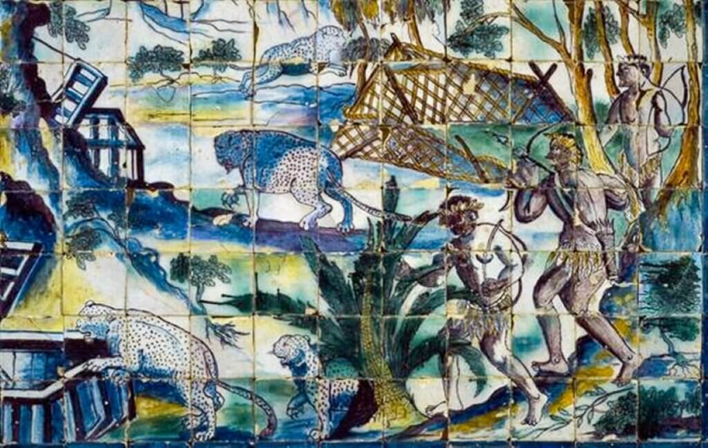 An artistic picture of a jungle with hunters and animals is created using colorful ceramic tiles.