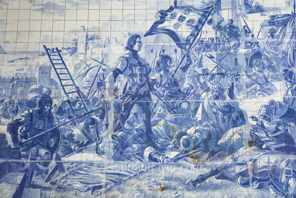 A mural depicting a warrior defeating the enemy and conquering a port.
