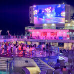 Princess Mexican Riviera cruise daily activities patters feature a deck party scene with a live band and colorful lights.