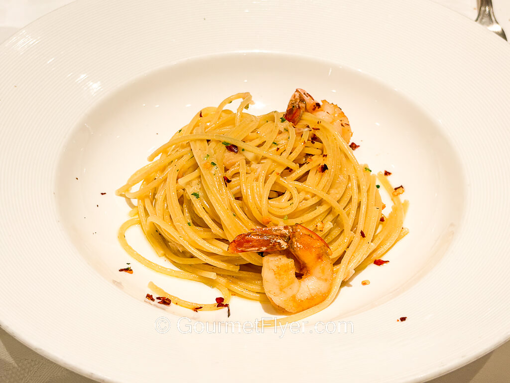 A dish of spaghetti and shrimps.